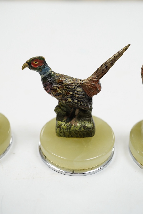 A cased Asprey set of four cold painted bronze and chrome plated novelty game bird menu holders, tallest 5cm high. Condition - good